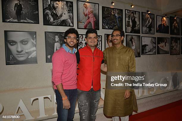 Uddhav Thackeray, Tejas Thackeray with Dabboo Ratnani at his 2015 calender launch in Mumbai.