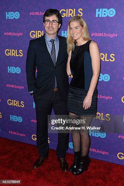 Comedian John Oliver and Kate Norley attend the "Girls" season three premiere at Jazz at Lincoln Center on January 6, 2014 in New York City.