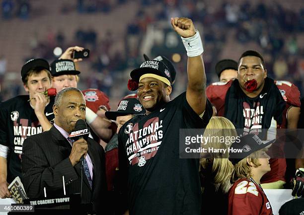 Quarterback Jameis Winston of the Florida State Seminoles celebrates after defeating the Auburn Tigers 34-31 in the 2014 Vizio BCS National...