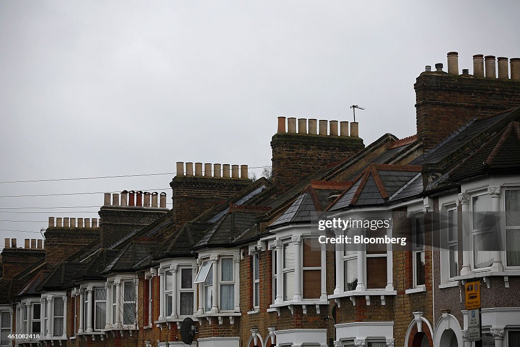 Estate Agents For Sale Signs And Residential Properties As U.K. House-Price Growth Slows