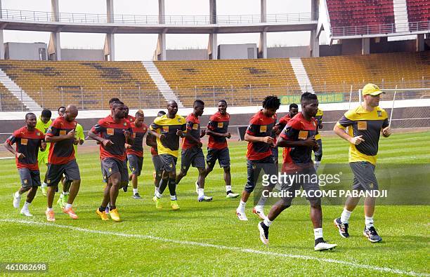 Members of the Cameroon national football team are seen training in the grounds of the Yaounde Ahmadou Ahidjo Stadium, on January 6, 2015. Cameroon,...