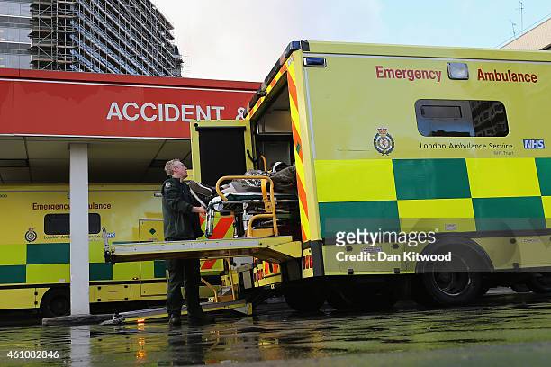 Patient is taken from an ambulance outside the Accident and Emergency ward at St Thomas' Hospital on January 6, 2015 in London, United Kingdom....