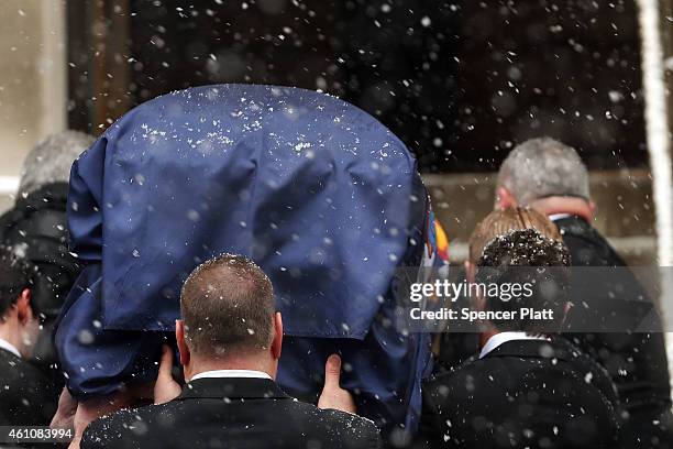 The casket of former three-term governor Mario Cuomo arrives at St. Ignatius Loyola Church on January 6, 2015 in New York City. Mario Cuomo, who was...