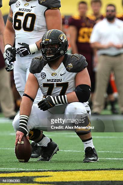 Evan Boehm of the Missouri Tigers sets the football during the Buffalo Wild Wings Citrus Bowl between the Minnesota Golden Gophers and the Missouri...