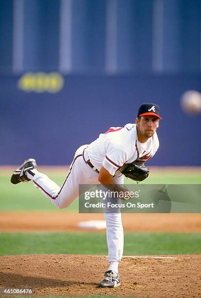 John Smoltz of the Atlanta Braves pitches during an Major League Baseball spring training game circa 1996 at West Palm Beach Municipal Stadium in...