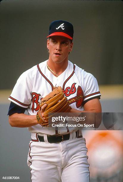 Tom Glavine of the Atlanta Braves pitches during an Major League Baseball game circa 1990 at Atlanta-Fulton County Stadium in Atlanta, Georgia....