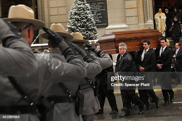 The casket of former three-term governor Mario Cuomo departs St. Ignatius Loyola Church on January 6, 2015 in New York City. Mario Cuomo, who was...