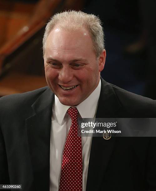Majority Whip Steve Scalise talks to other members during the first session of the 114th Congress in the House Chambers January 6, 2015 in...