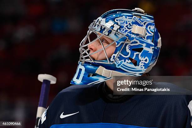 Ville Husso of Team Finland looks on during stoppage in a preliminary round game during the 2015 IIHF World Junior Hockey Championships against Team...