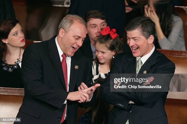 House Majority Whip Steve Scalise talks with Rep. Jeb Hensarling during the opening session of the 114th Congress inside the House of Representatives...