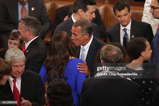 Speaker of the House John Boehner greets Rep. Elise Stefanik during the opening session of the 114th Congress in the House of Representatives chamber...