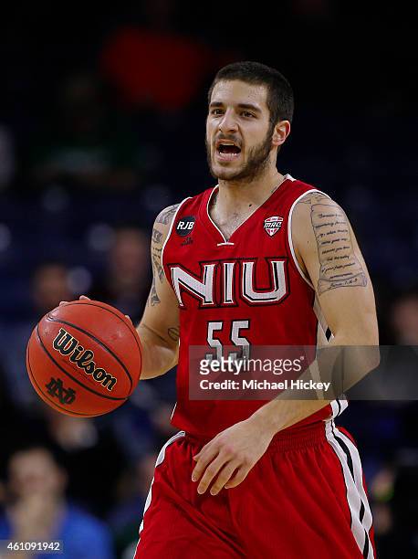 Michael Orris of the Northern Illinois Huskies brings the ball up court during the game against the Notre Dame Fighting Irish at Purcell Pavilion on...