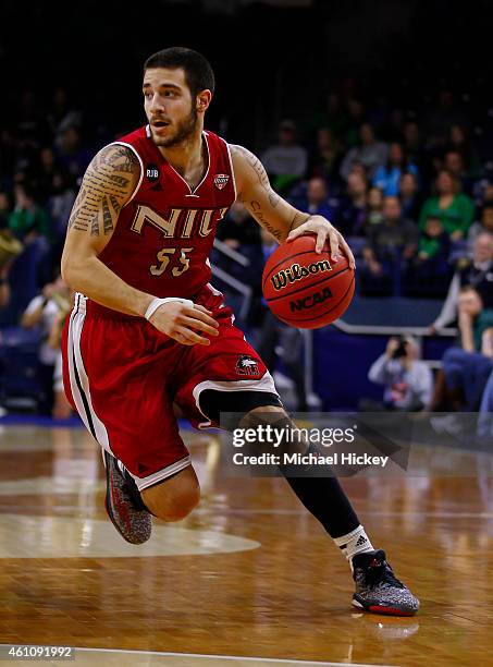 Michael Orris of the Northern Illinois Huskies drives to the basket against the Notre Dame Fighting Irish at Purcell Pavilion on December 22, 2014 in...