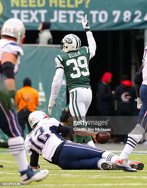 Antonio Allen of the New York Jets in action against Tom Brady of the New England Patriots on December 21, 2014 at MetLife Stadium in East...