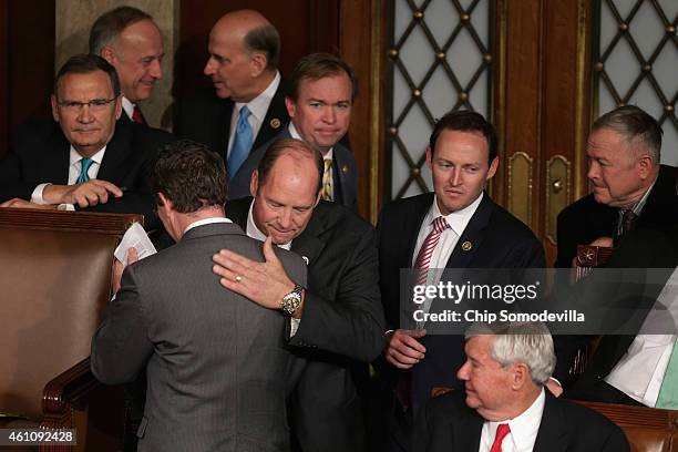 Rep. Ted Yoho gives a hug to a supporter after voting for himself in the race for the Speaker of the House inside the House of Representatives...