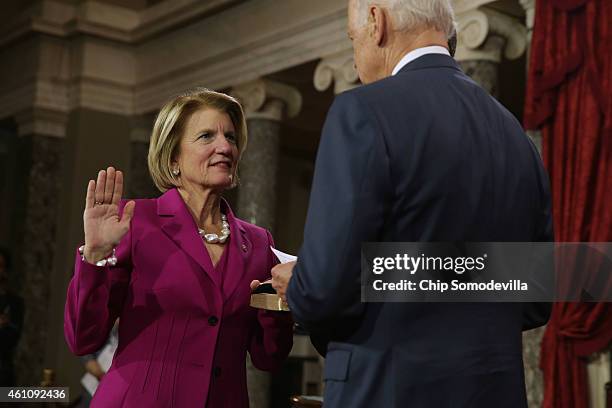 Sen. Shelley Moore Capito is ceremonially sworn in by Vice President Joe Biden in the Old Senate Chamber at the U.S. Capitol January 6, 2015 in...