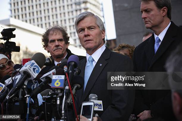 Former Virginia Governor Robert McDonnell speaks to members of the media as his lead attorney Henry Asbill looks on outside U.S. District Court for...