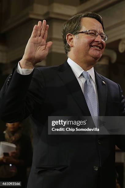 Sen. Gary Peters is ceremonially sworn in by Vice President Joe Biden in the Old Senate Chamber at the U.S. Capitol January 6, 2015 in Washington,...