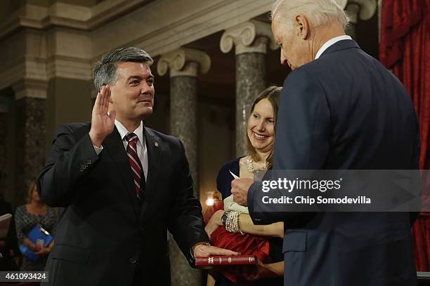 Sen. Cory Gardner is ceremonially sworn in by Vice President Joe Biden in the Old Senate Chamber with Gardner's wife Jaime Gardner at the U.S....