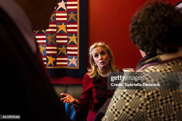 Rep. Debbie Dingell greets supporters during an open house at her office in the House Canon Office building on Capitol Hill on January 6, 2015 in...