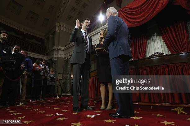 Sen. Tom Cotton is ceremonially sworn in by Vice President Joe Biden in the Old Senate Chamber with Cotton's wife Anna Cotton at the U.S. Capitol...
