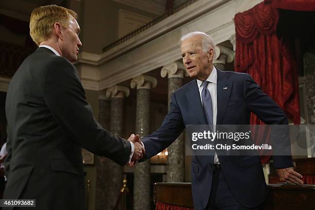 Sen. James Lankford is greeted by Vice President Joe Biden during a ceremonial swearing in at the Old Senate Chamber at the U.S. Capitol January 6,...