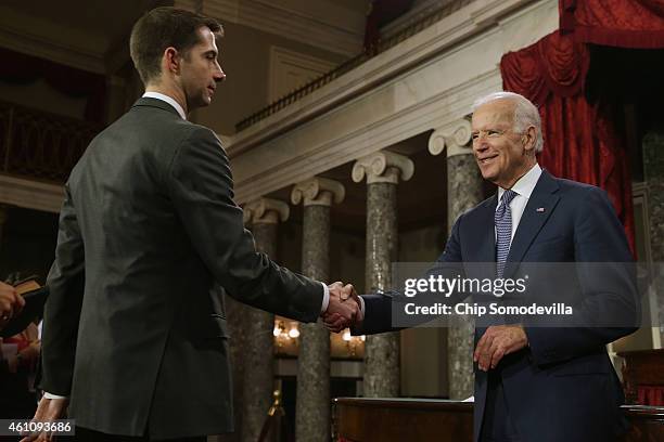 Sen. Tom Cotton is greeted by Vice President Joe Biden during a ceremonial swearing in at the Old Senate Chamber at the U.S. Capitol January 6, 2015...