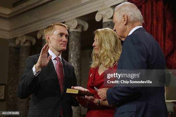 Sen. James Lankford is ceremonially sworn in by Vice President Joe Biden in the Old Senate Chamber with Lankford's wife Cindy Lankford at the U.S....