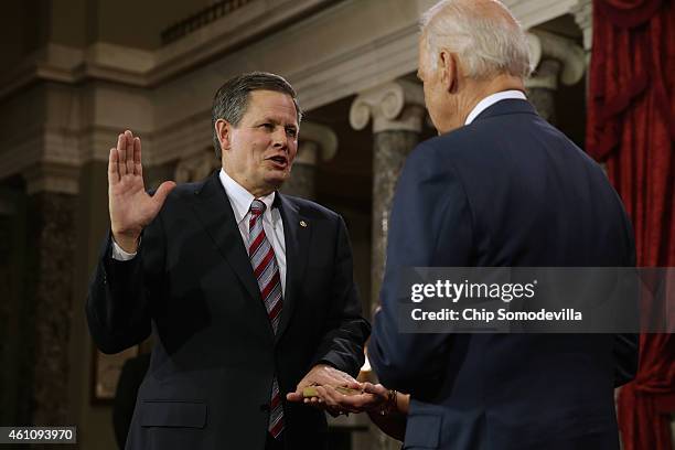 Sen. Steve Daines is ceremonially sworn in by Vice President Joe Biden in the Old Senate Chamber at the U.S. Capitol January 6, 2015 in Washington,...