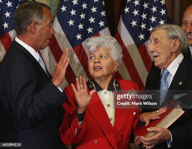 Speaker of the House John Boehner poses with Rep. Grace Napolitano during a ceremonial swearing in at the US Capitol January 6, 2015 in Washington,...