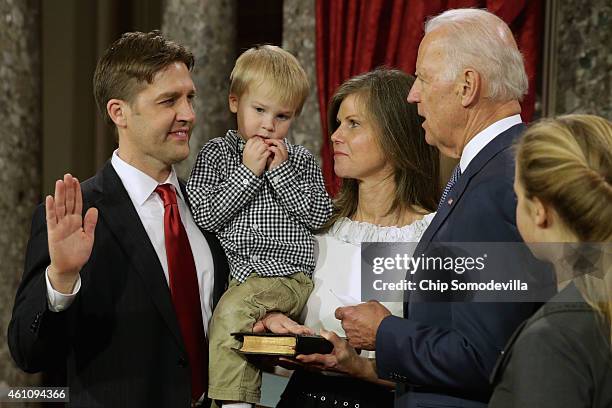 Sen. Ben Sasse is ceremonially sworn in by U.S. Vice President Joe Biden with Sasse's wife Melissa Sasse, son Augustin Sasse and daughter Elizabeth...