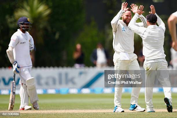 Mark Craig of New Zealand celebrates his wicket of Rangana Herath of Sri Lanka during day five of the Second Test match between New Zealand and Sri...