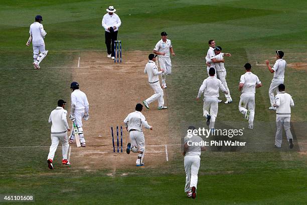 Tim Southee of New Zealand is hugged by Brendon McCullum as he celebrates his wicket of Nuwan Pradeep of Sri Lanka to win the match and the series...