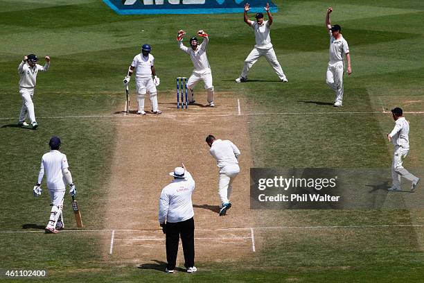 New Zealand celebrates the wicket of Rangana Herath of Sri Lanka during day five of the Second Test match between New Zealand and Sri Lanka at Basin...