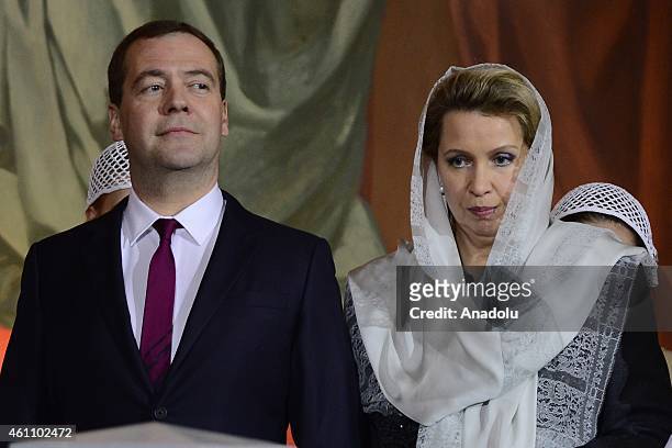 Russian Prime Minister Dmitry Medvedev and his wife Svetlana Medvedev attend the Christmas Eve mass leaded by Russian Patriarch Kirill at the Christ...