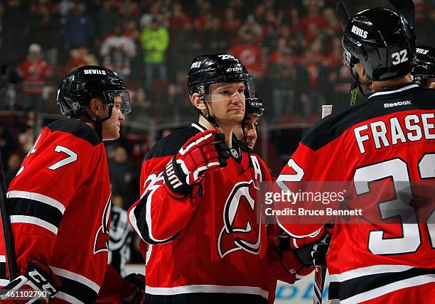 Patrik Elias of the New Jersey Devils celebrates a 4-1 victory over the Buffalo Sabres at the Prudential Center on January 6, 2015 in Newark, New...
