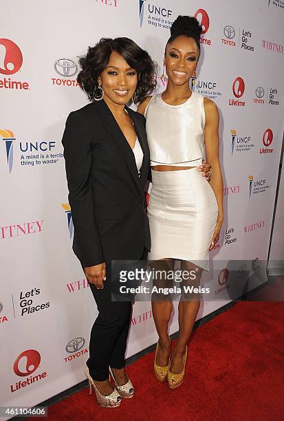 Director Angela Bassett and actress Yaya DaCosta arrive at the premiere of Lifetime's "Whitney" at The Paley Center for Media on January 6, 2015 in...