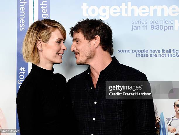 Actors Sarah Paulson and Pedro Pascal arrive at the Premiere of HBO's "Togetherness" at Avalon on January 6, 2015 in Hollywood, California.