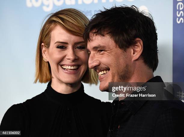 Actors Sarah Paulson and Pedro Pascal arrive at the Premiere of HBO's "Togetherness" at Avalon on January 6, 2015 in Hollywood, California.