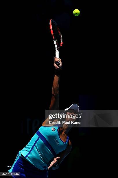 Heather Watson of Great Britain serves in her match against Agnieszka Radwanska of Poland during day four of the 2015 Hopman Cup at Perth Arena on...