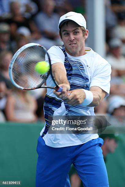 Bradley Klahn of USA plays a shot against Daniel Brands of Germany before rain interrupted play in the second set during day two of the Heineken Open...