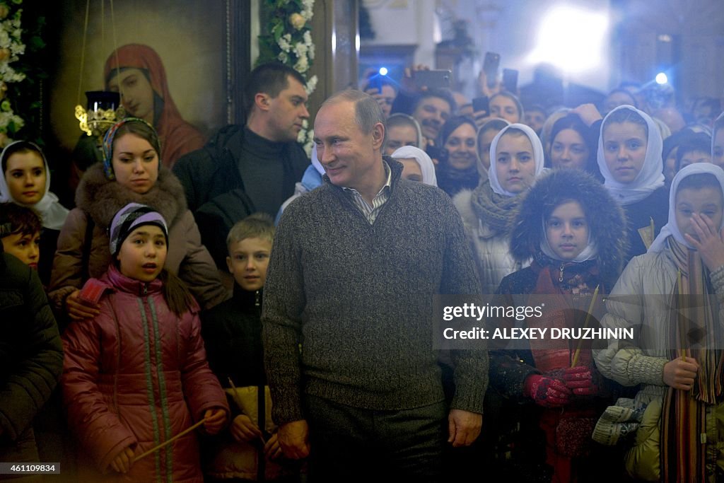 RUSSIA-POLITICS-RELIGION-CHRISTMAS-PUTIN