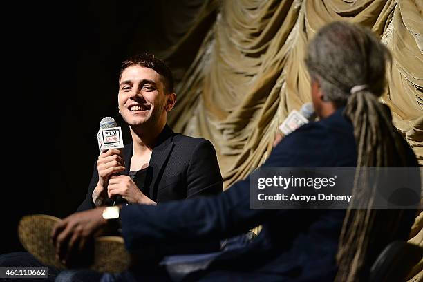 Xavier Dolan and Elvis Mitchell attend the Film Independent at LACMA screening and Q&A of "Mommy" at Bing Theatre At LACMA on January 6, 2015 in Los...