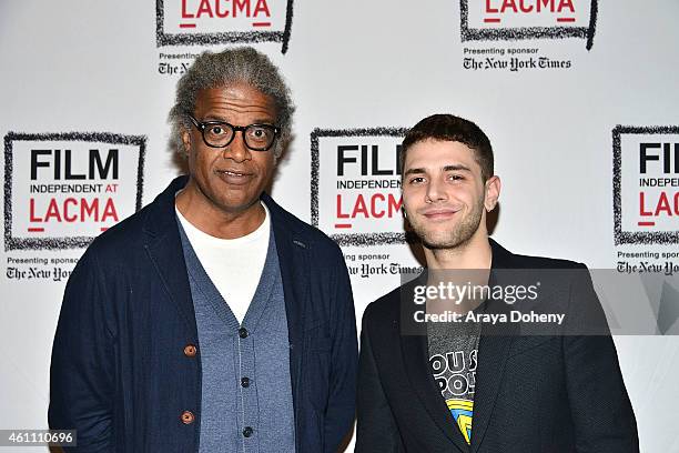 Elvis Mitchell and Xavier Dolan attend the Film Independent at LACMA screening and Q&A of "Mommy" at Bing Theatre At LACMA on January 6, 2015 in Los...