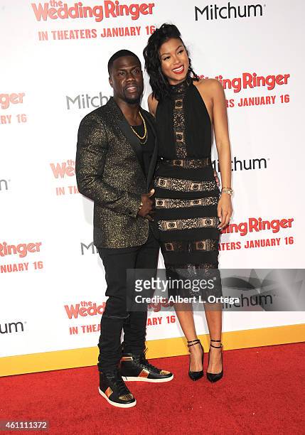 Actor Kevin Hart and model/fiance Eniko Parrish arrive for the Premiere Of Screen Gems' "The Wedding Ringer" held at TCL Chinese Theatre on January...