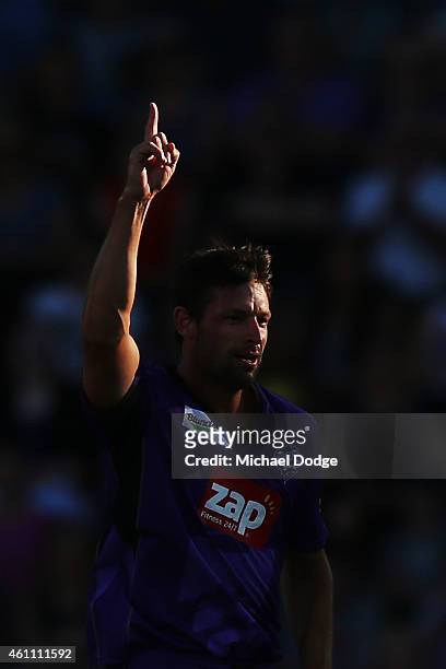 Ben Hilfenhaus of the Hurricanes celebrates the wicket of Aaron Finch of the Renegades during the Big Bash League match between the Hobart Hurricanes...