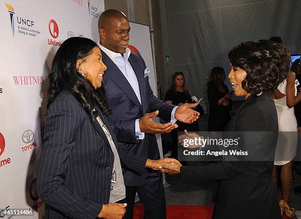 Earlitha Kelly, Magic Johnson and Angela Bassett arrive at the premiere of Lifetime's "Whitney" at The Paley Center for Media on January 6, 2015 in...