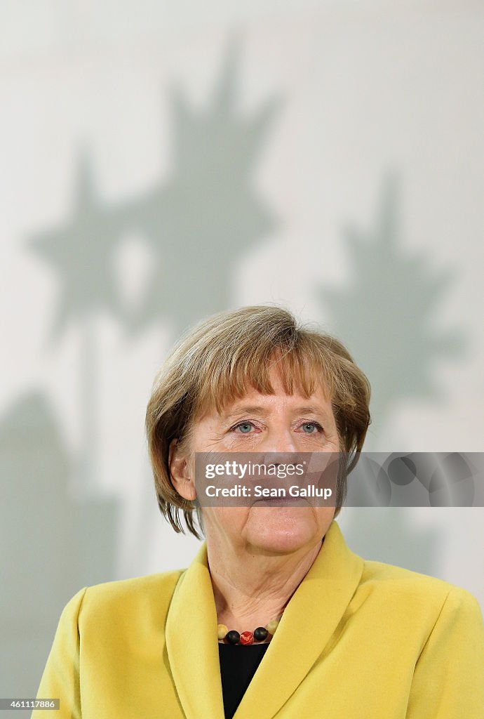 Merkel Receives Epiphany Singers