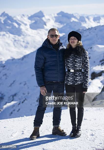 British actor Daniel Craig poses with actress Lea Seydoux of France with Tyrolean Alps in the background during a photo call of the new James Bond...