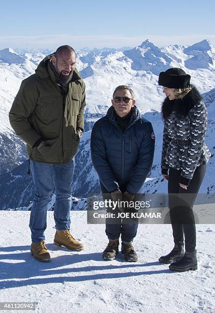 British actor Daniel Craig , French actress Lea Seydoux and US actor Dave Bautista pose with Tyrolean Alps in the background during a photo call of...